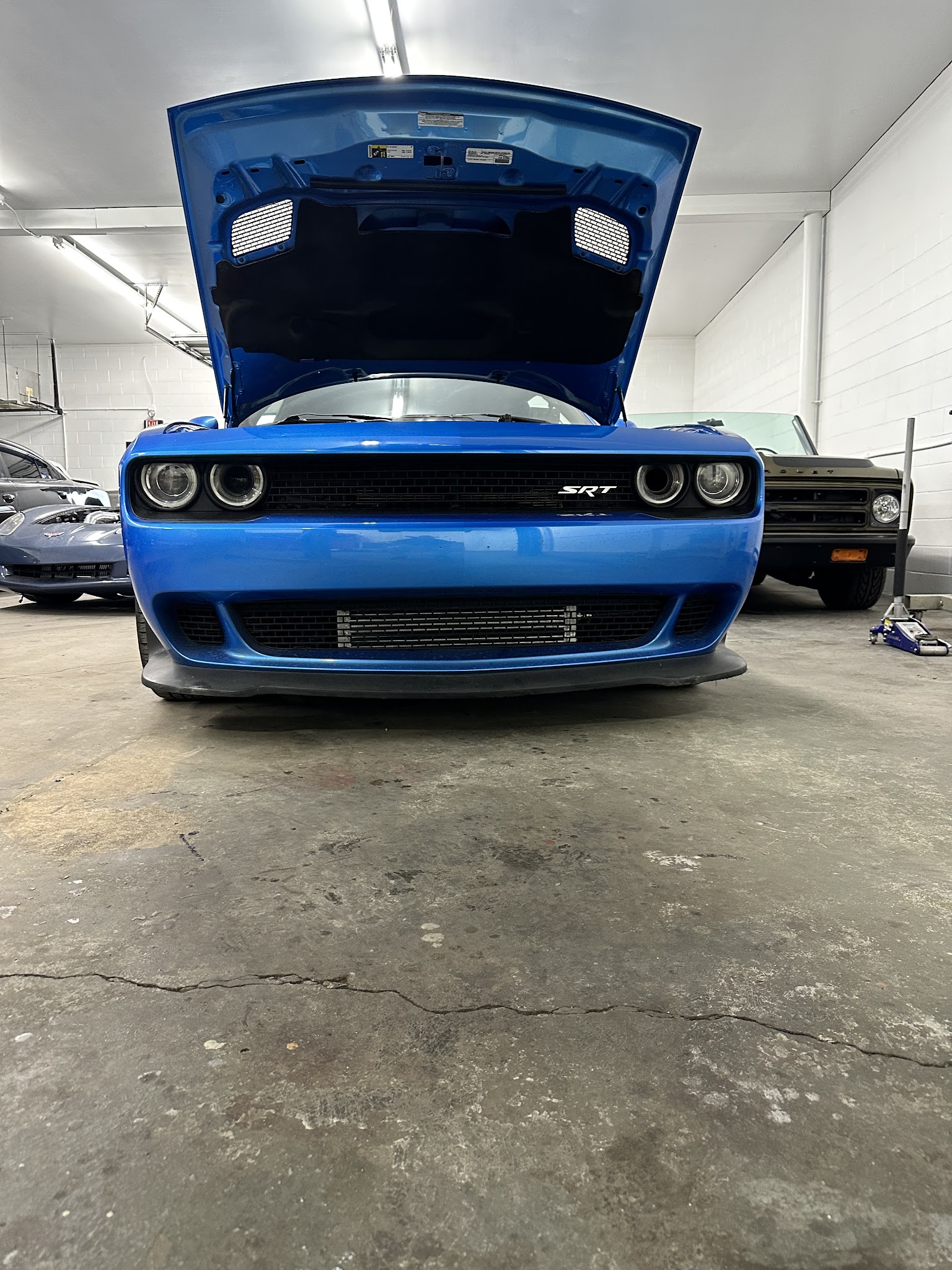 Supercharged HEMI in the shop for a pulley, heat exchanger and header upgrade in Nashville